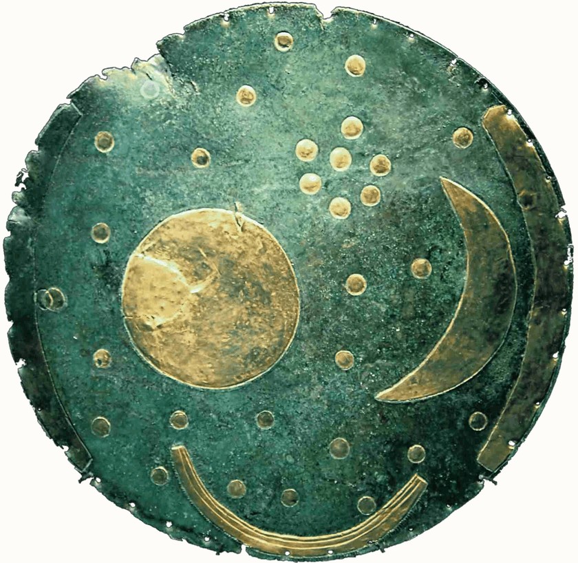 The Nebra sky disc, a bronze disc inlaid with gold sun, moon, and star motifs